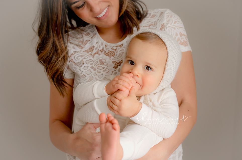 baby eating toes-cute baby toes-1 year portrait-sacramento photographer-shan cait photography